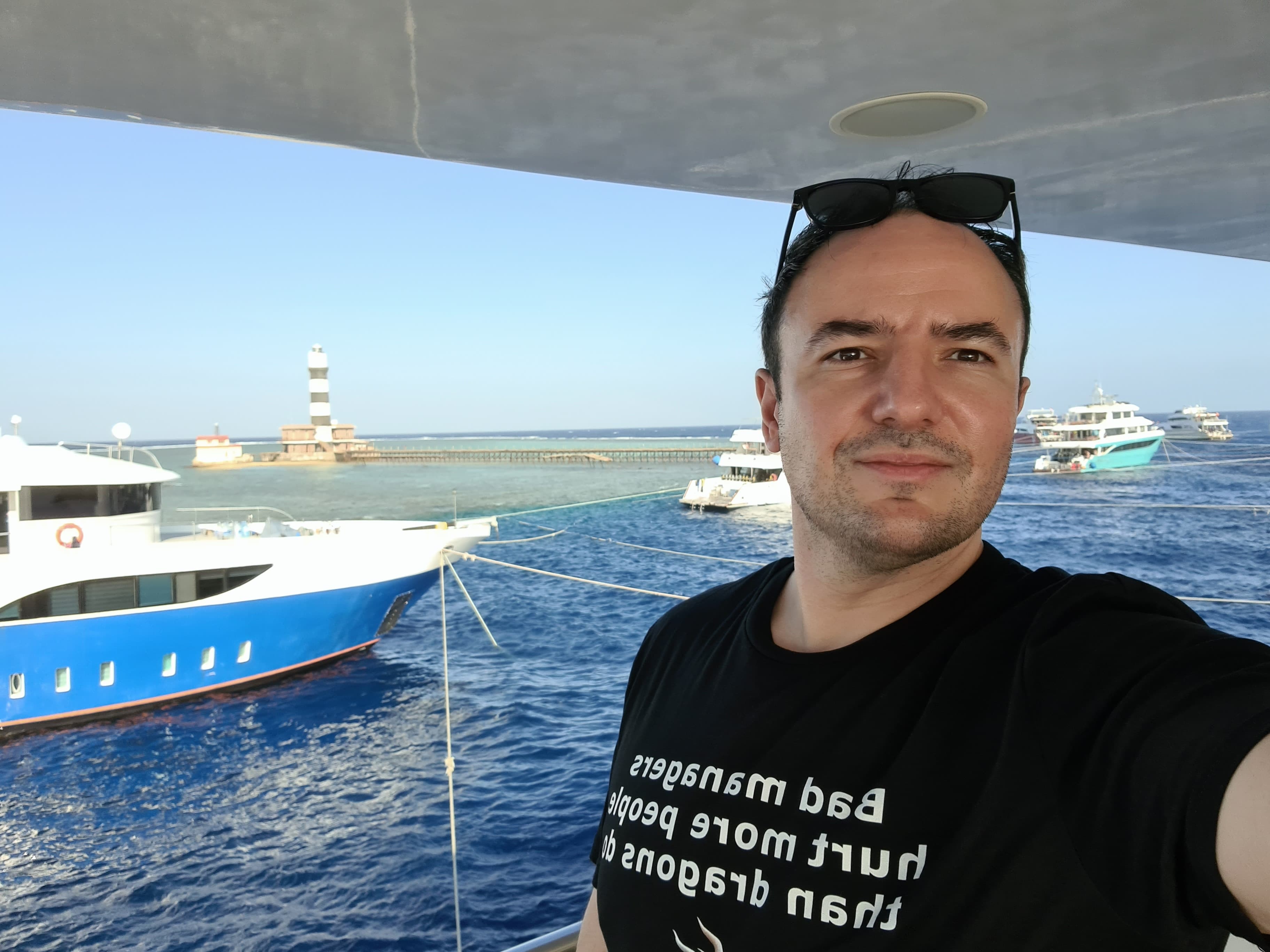 selfie of Dan on a boat